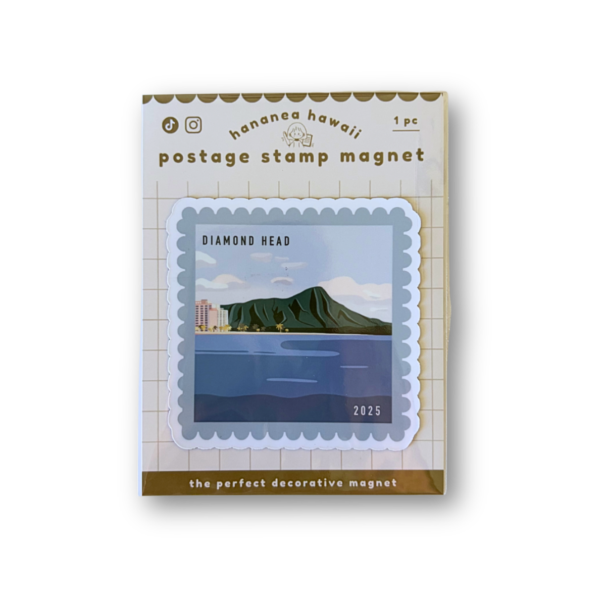A postage stamp magnet product shown in its retail packaging on a white background. The package reads 'hawaii hawaii' and 'postage stamp magnet' with a sample stamp design featuring a green mountain and blue water labeled 'DIAMOND  HEAD 2025ʻ.