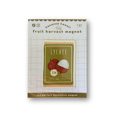 A packaged decorative fruit harvest magnet for 'Lychee' b, shown on a clean white background. The product is a small square magnet featuring an illustration of a red lychee and a white lychee half, set against a greenish-olive background with vintage-style text.