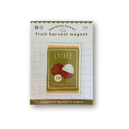 A packaged decorative fruit harvest magnet for 'Lychee' shown on a clean white background. The product is a small square magnet featuring an illustration of a red lychee and a white lychee half, set against a greenish-olive background with vintage-style text.