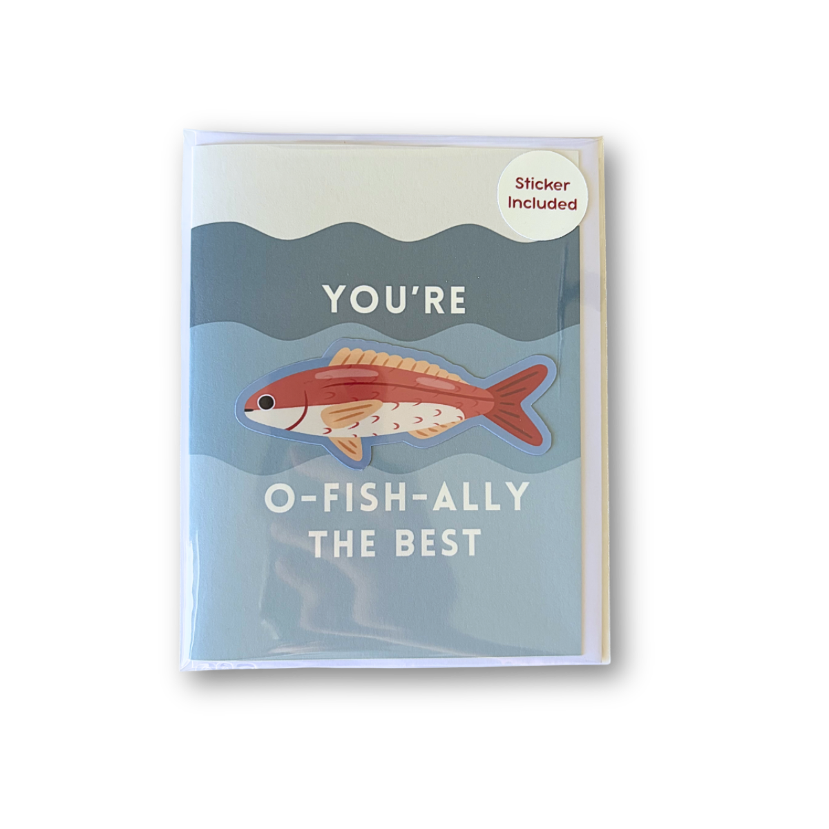 A greeting card with a light blue and gray underwater illustration, featuring a red-orange fish and the text 'YOU'RE O-FISH-ALLY THE BEST'. A small circular sticker in the top right corner reads 'Sticker Included'.