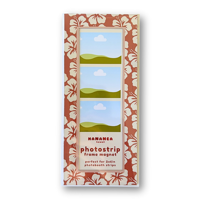 A packaged photo strip frame magnet featuring a tropical floral pattern border.