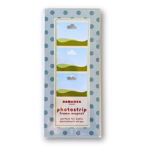 A packaged photo strip frame magnet, featuring a vertical rectangular box a blue and white polka dot border.