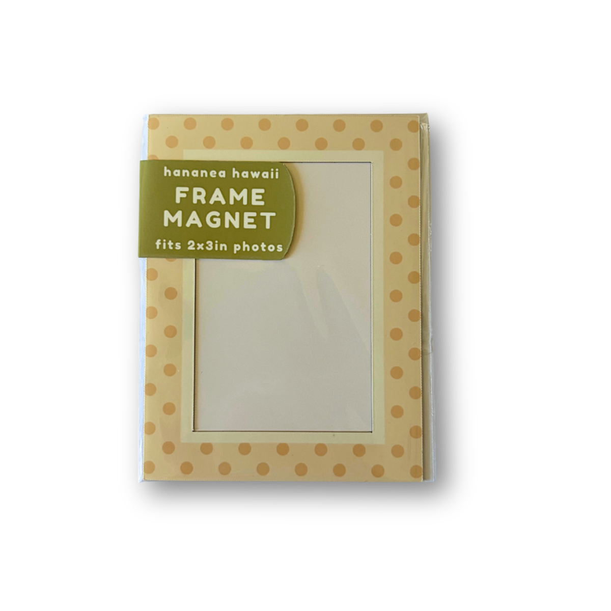 A rectangular picture frame magnet featuring a tan and yellow polka dot pattern with a green label on the top left, shown on a white background.