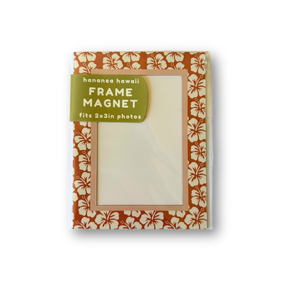A rectangular frame magnet with a red hibiscus border.
