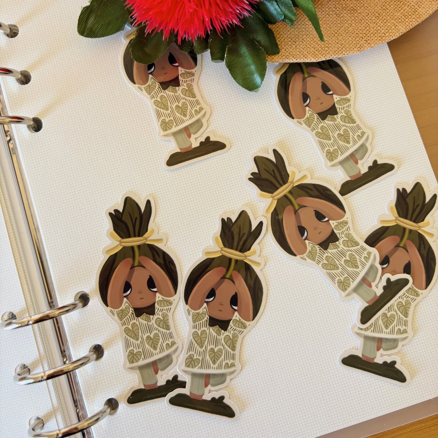 little miss laulau on a notebook